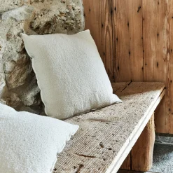 Coussin en polyester effet bouclette finition point bourdon 45x45cm - beige sable