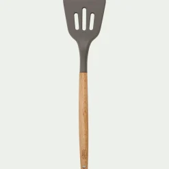 Spatule plate ajourée en bois et silicone - brun terre ombre