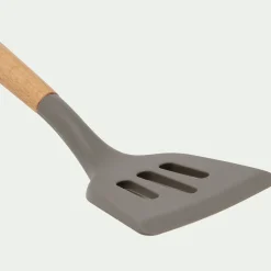 Spatule plate ajourée en bois et silicone - brun terre ombre