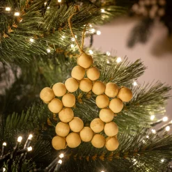 Suspension de Noël étoile en bois H11cm - naturel